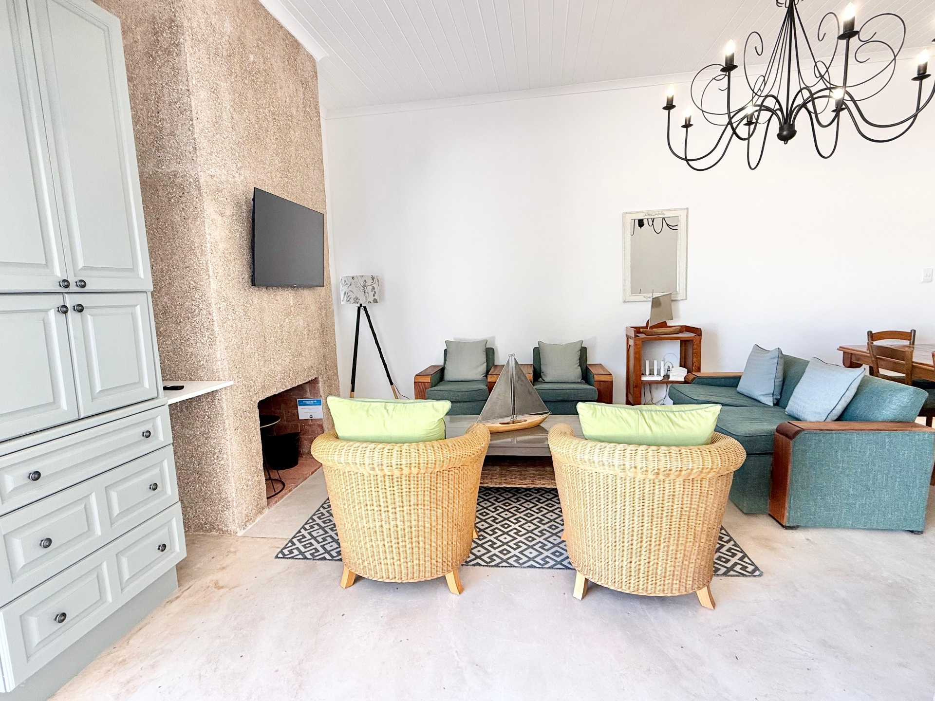 Lounge with wicker chairs and sofas