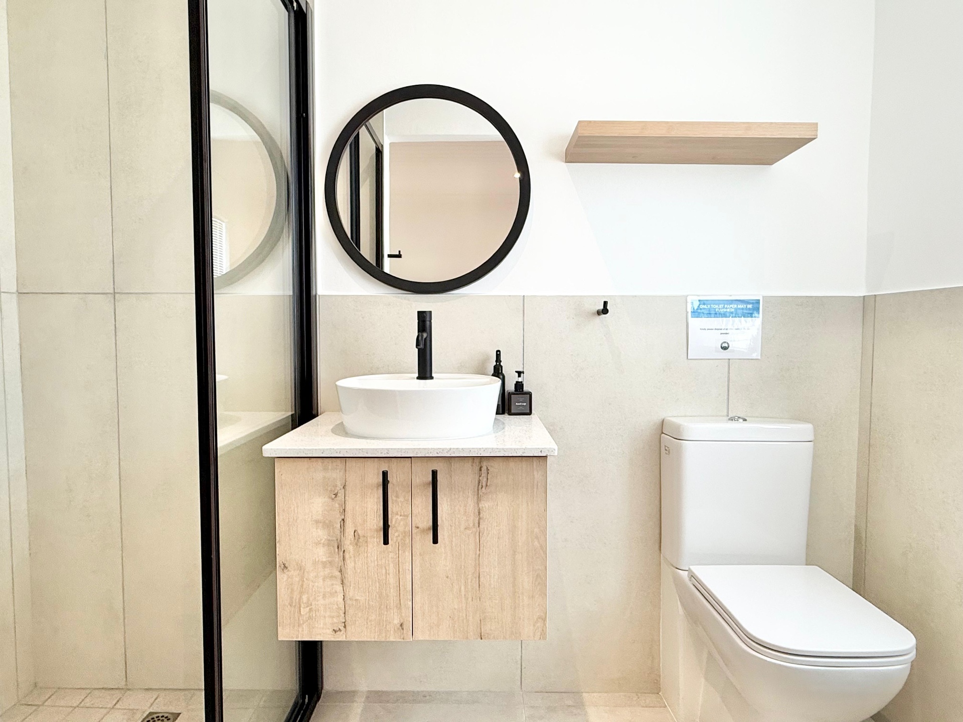 Bathroom with timber vanity and vessel basin